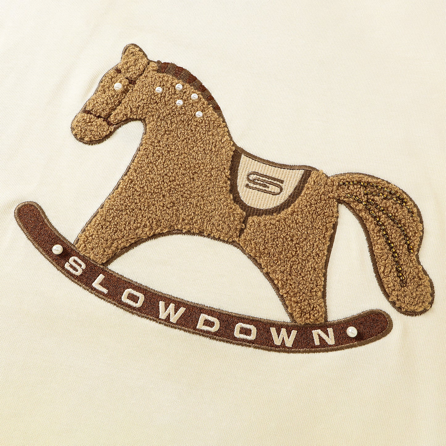 SLOWDOWN Gentle Pony Tee Cream (SS26)
